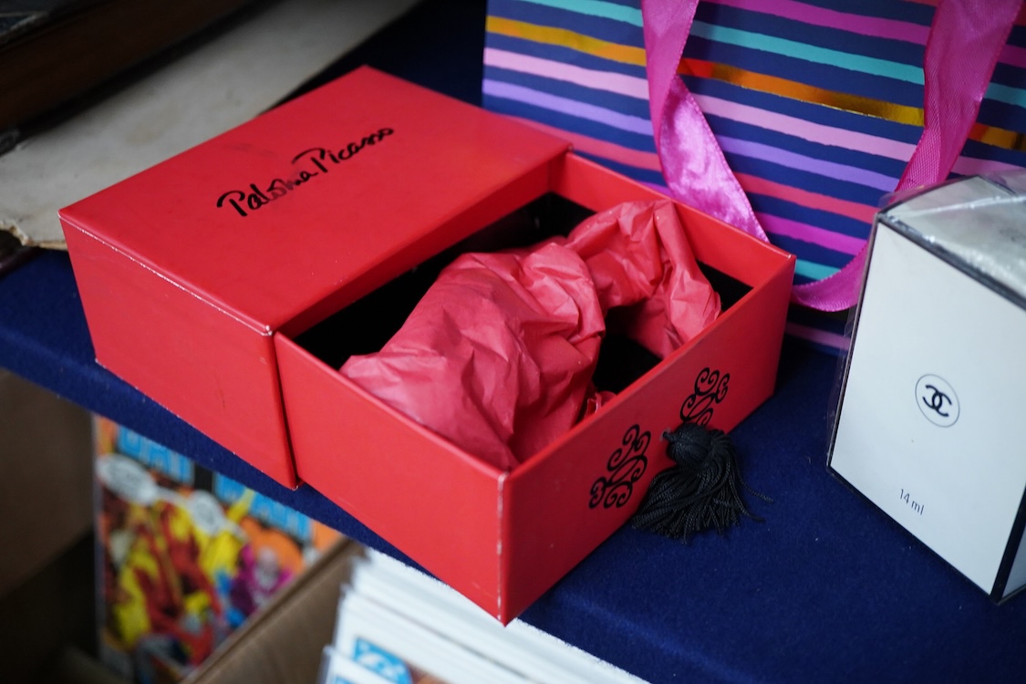 An unopened bottle of Chanel No.22 perfume, together with a boxed Paloma Picasso lipstick